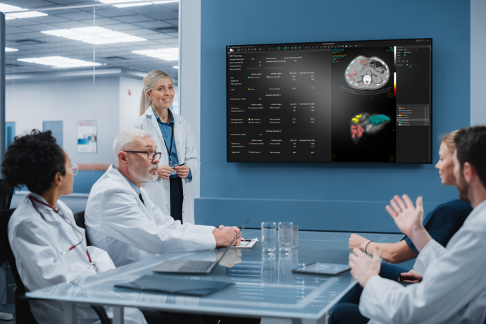 Doctors discussing Hermia SIRT.